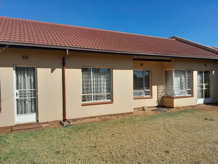 For Sale: Townhouse in Simmerfield with private garden, double garages, and excellent security.