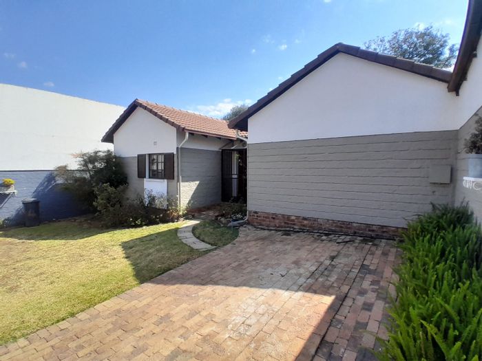 For Sale: House in Halfway Gardens with garden, garage, and secure access.