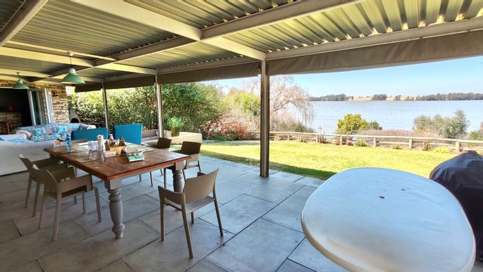 House For Sale in Vaal Marina Central: Waterfront, fully furnished, private boating garage.