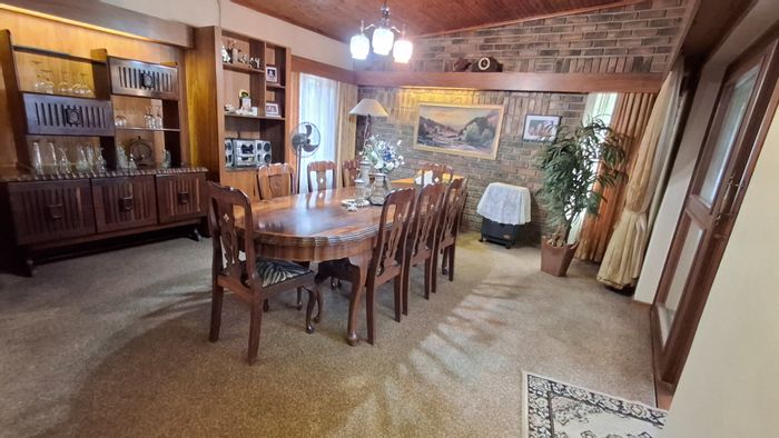 4-Bedroom House For Sale in Pretoria Gardens with spacious yard and entertainment lapa.