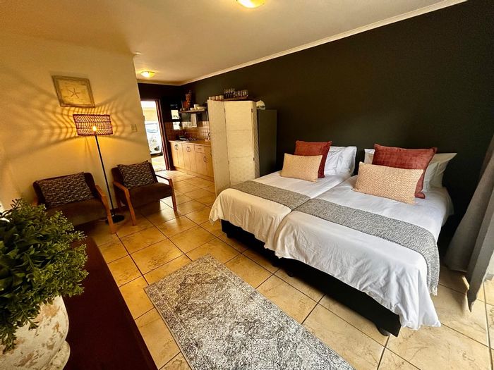 For Sale: Ground floor 1-bedroom apartment in Ferreira Town, fully furnished, secure living.