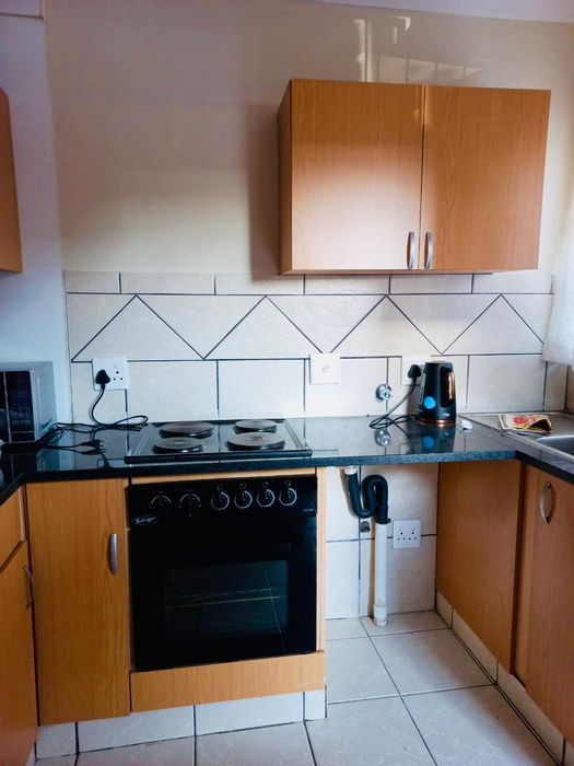 For Sale: 2-Bedroom Apartment in Pretoria North with Pool, Balcony, and Security.