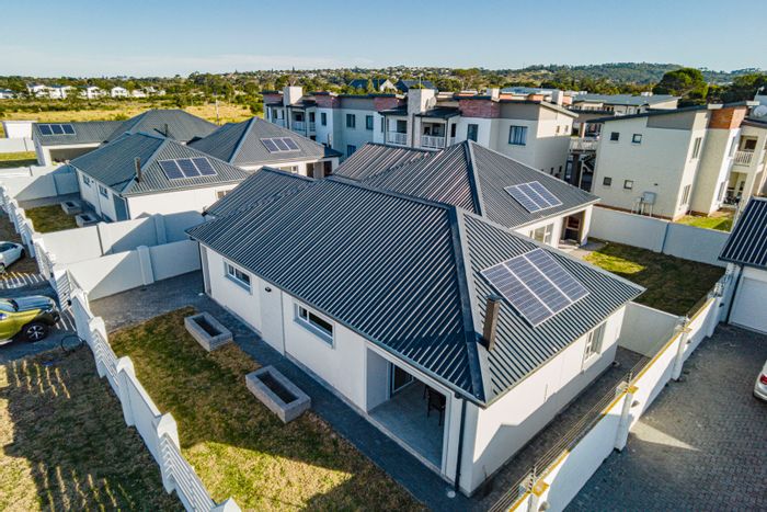 For Sale: House in Pinelands with 3 bedrooms, garage, and outdoor entertainment area.