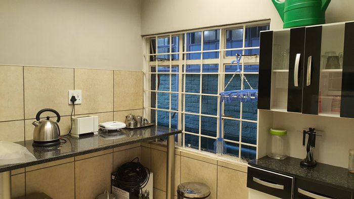 Commercial property for sale in Geduld Ext 2 with workshop, offices, and crane.