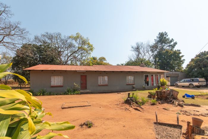 For Sale: White River Estates Farm with 5 houses, water rights, and income potential.