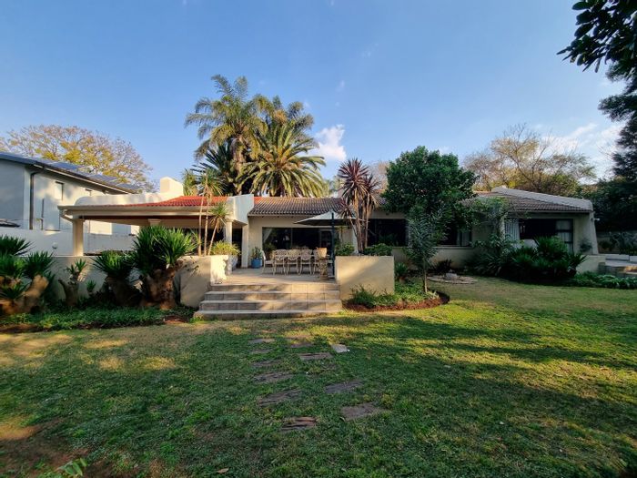 Expansive 4-bedroom house with large garden, double garage, and domestic accommodation in Bedfordview Central. To Rent.
