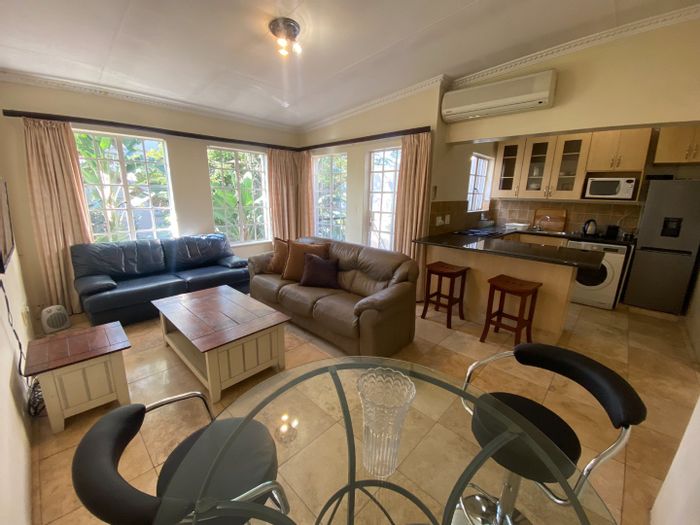 Furnished 1-bedroom apartment in Sandton Central, secure complex with pool and clubhouse.