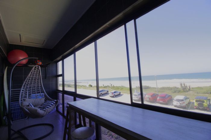 Coastal apartment in Jeffreys Bay Central, 2 beds, ocean views, investment potential. For Sale.