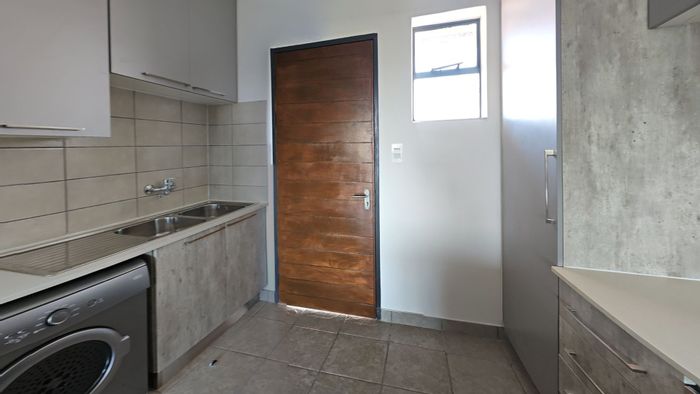 For Sale: 2-Bedroom Apartment in Monavoni with Garden, Security, and Convenient Access.