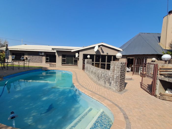 Neserhof House For Sale: 4 Bedrooms, pool, flatlet, security features, and borehole.