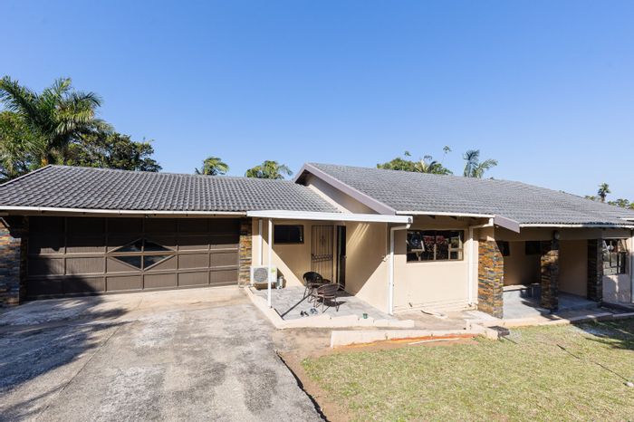For Sale: Spacious 4-bedroom house with pool, garden, and double garage in Shelly Beach.