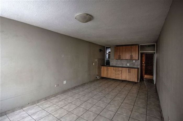 For Sale: Apartment in Kempton Park Central with secure parking and nearby amenities.