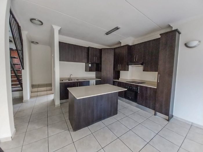 For Sale: Townhouse in Pretoriuspark with garden, pool, and 24-hour security.