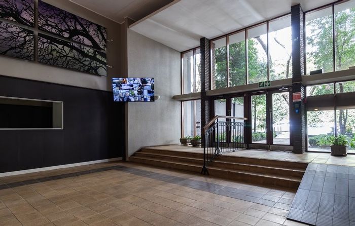 For Sale: 2-Bedroom Apartment in Rosebank near Mall, Gautrain, and amenities.