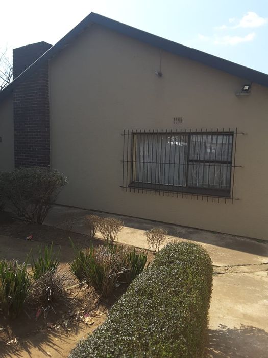 Spacious 3-bedroom house with pool, garage, and maid room in Booysens. For Sale.