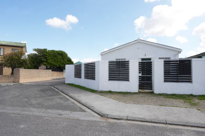 New Woodlands House For Sale: Secure two-bedroom home with ample parking and extension potential.