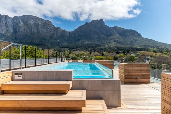 Newlands Apartment For Sale: 3 beds, secure living, pool, and mountain views.