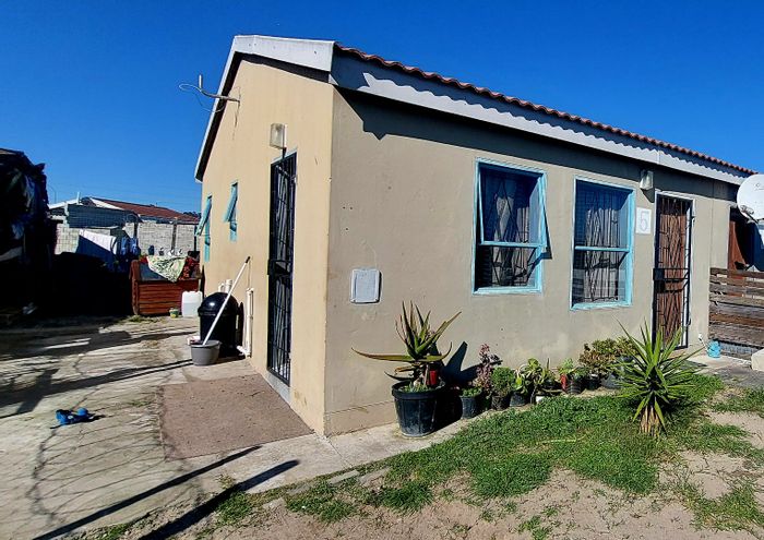 2-Bedroom House For Sale in Kuils River South with parking and proximity to amenities.