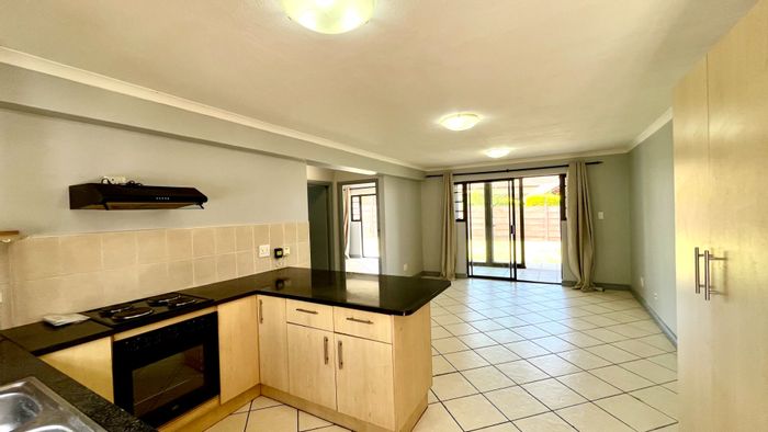 Ground-floor apartment in Hartenbos Central for sale, close to amenities and beach.