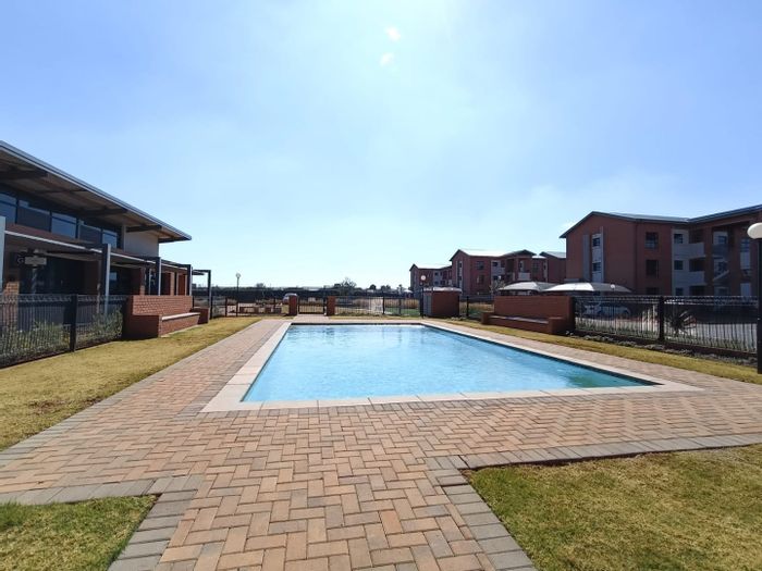 Olivewood Apartment To Rent: 2 bedrooms, enclosed balcony, ideal for versatile living.