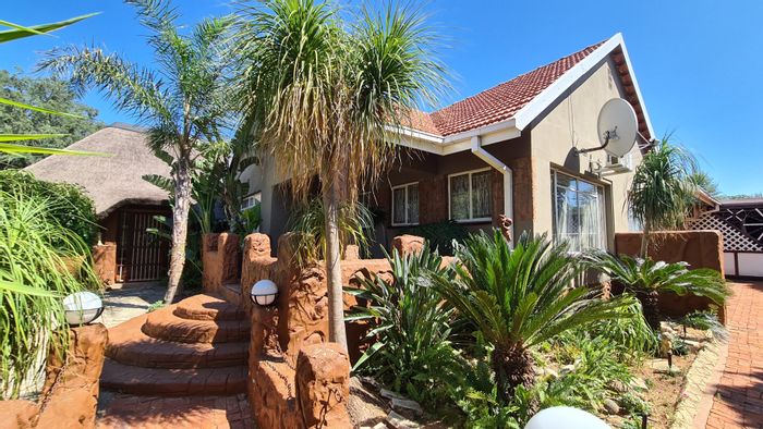 For Sale: House in Roosheuwel Ext 1 with 4 beds, pool, lapa, and garages.