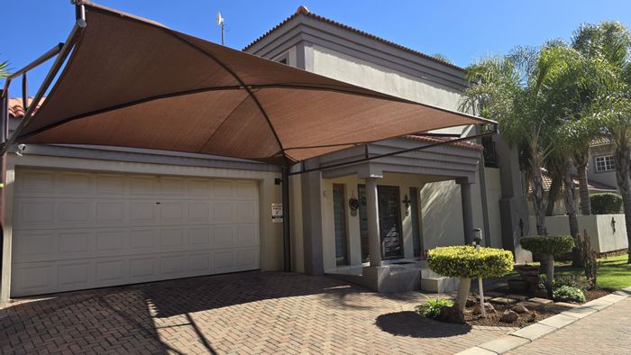 For Sale: Doringkruin Townhouse with 3 beds, garage, inverter, and jacuzzi.