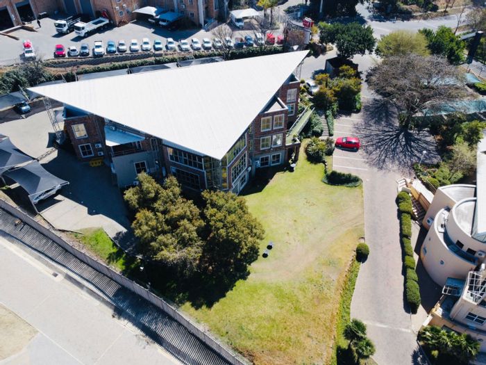 Commercial property for sale in Kyalami Park with rental income and track views.