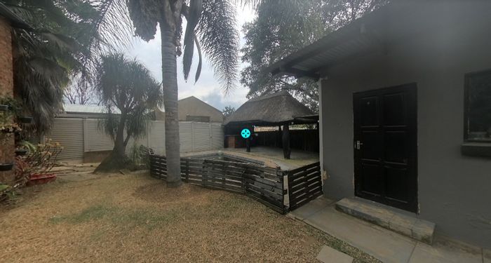 Versatile Capital Park house for sale with dual dwellings and rental income potential.