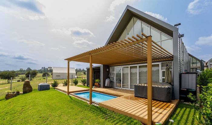 Eco-friendly house for sale in Nooitgedacht with solar, borehole, and Montessori school.