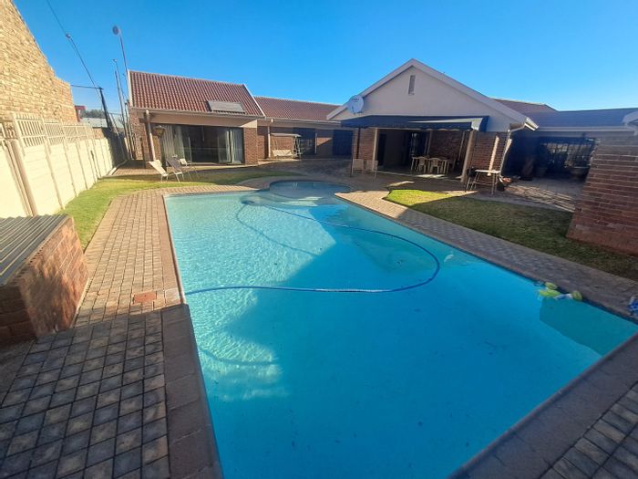 For Sale: Spacious 4-bedroom house in Wilkoppies with pool and entertainment area.