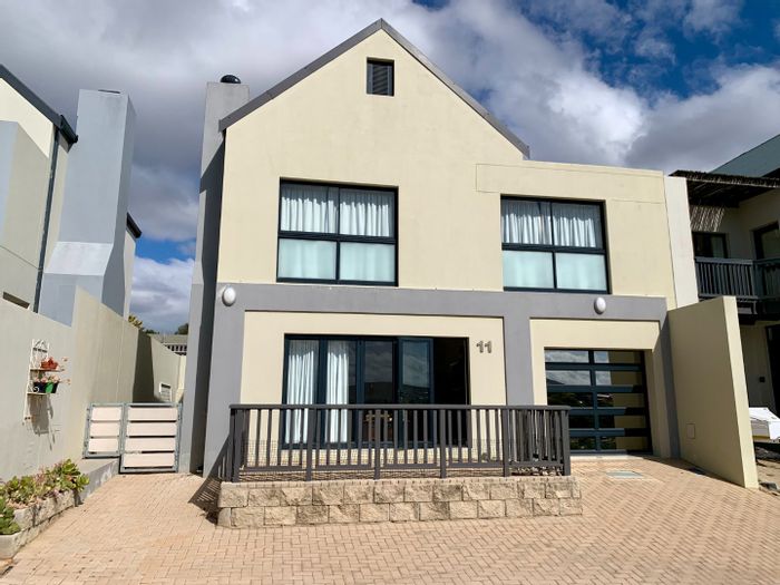 For Sale: House in Hartenbos Rural with river access, garage, and family-friendly playground.
