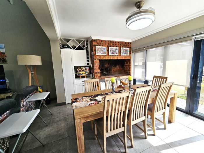 For Sale: House in Hartenbos Central with open-plan living, secure complex, and river views.