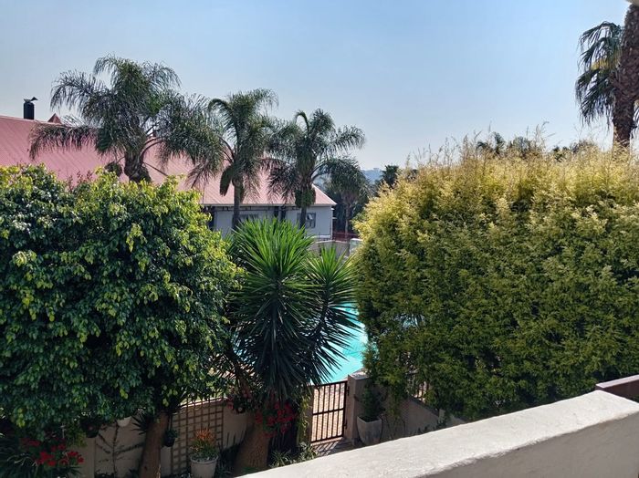 2-Bedroom Townhouse For Sale in Marais Steyn Park with pool access and balcony.