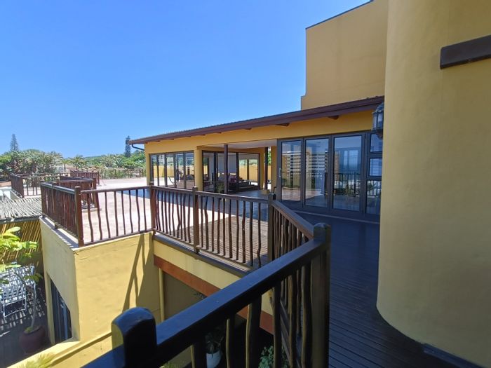 3-Bedroom Apartment To Rent in Umhlanga Central with pool, parking, and sea views.