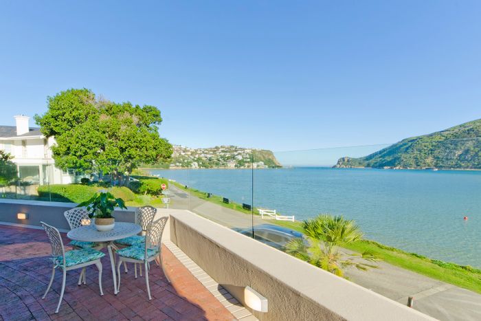 For Sale: Leisure Isle House with lagoon views, 4 bedrooms, and spacious living areas.