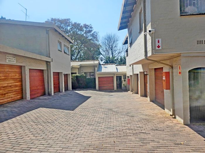 For Sale: Townhouse in Sandown with 3 bedrooms, double garage, private garden.