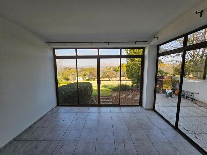 For Sale: 2-Bedroom Apartment at Mount Kos Estate with garden, pool, and tennis court.