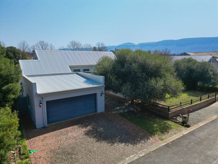 For Sale: Spacious 3-bedroom house in The Coves with garden and double garage.