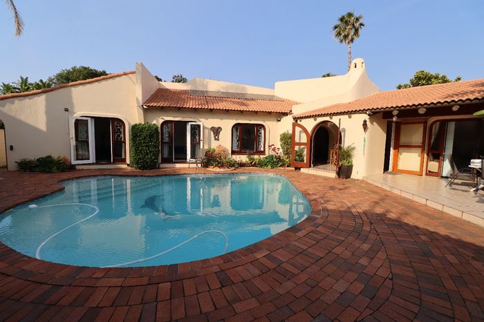 Villa-style house for sale in Summerstrand with pool, gym, and garden.