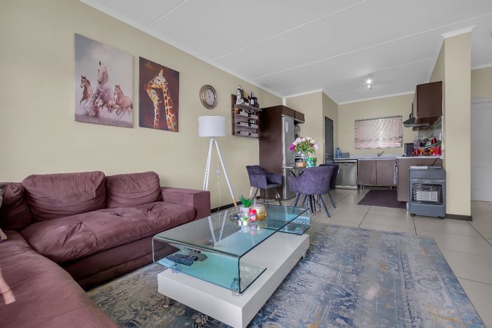 Two-bedroom apartment with balcony, clubhouse, pool, and 24/7 security in Fourways.