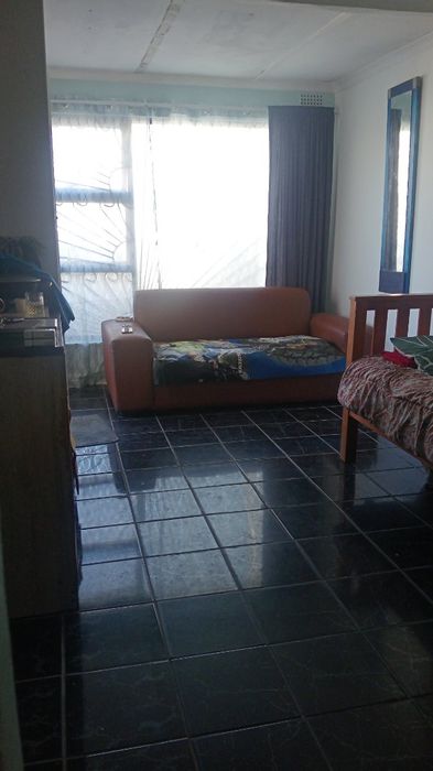 For Sale: 4-Bedroom House in Rocklands with Corner Plot and Parking for 3 Vehicles.