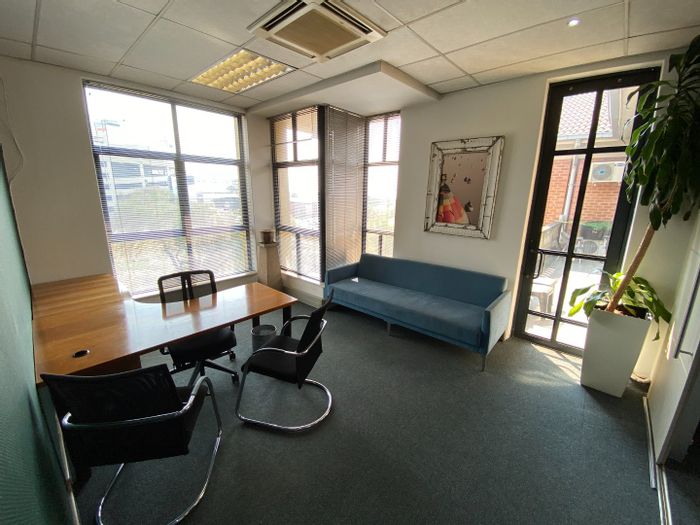 Commercial office suites for rent in Witkoppen, featuring meeting rooms and parking.