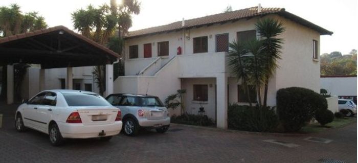 1-Bedroom House for Sale in Observatory with secure carport and open patio.
