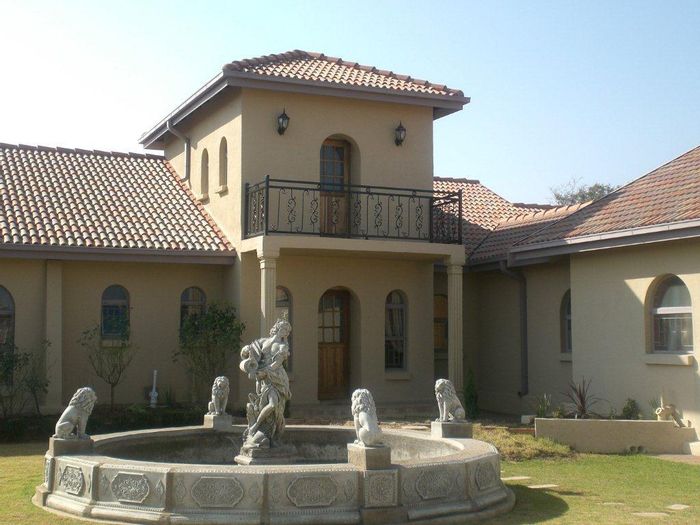8-Bedroom Guesthouse For Sale in Vryburg Central with ample amenities and security.