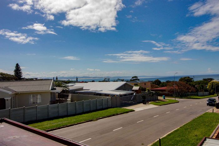 C Place House For Sale: Sea views, dual living potential, and spacious garage.