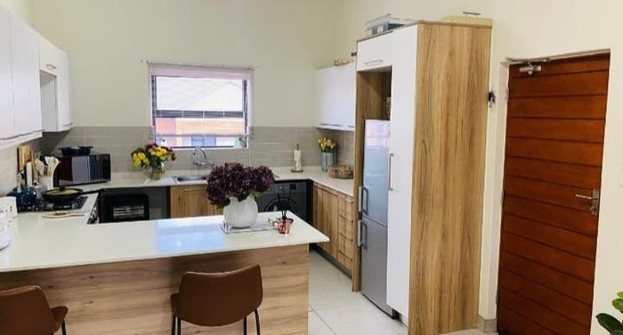 To Rent: Apartment in Modderfontein with 2 beds, pool, clubhouse, and security.