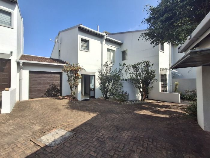 Townhouse for Sale in Southbroom Central: Golf access, beach proximity, communal pool.