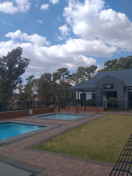 To Rent: Apartment in Modderfontein with gym, pool, and nature access.