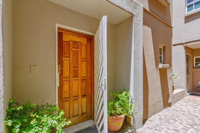 For Sale: Spacious Corlett Gardens Townhouse with garden, splash pool, and office area.