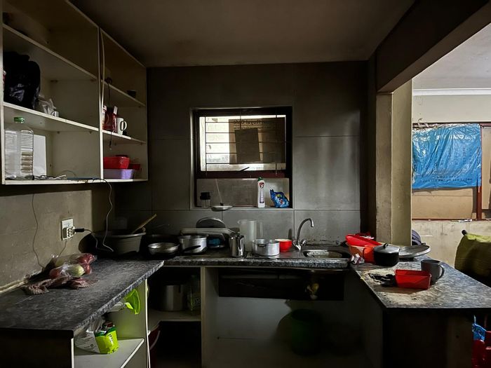 Maitland House For Sale: Duplex with rental income, shop lease, and potential.